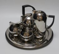 An Oliver Hemming Nio stainless steel tea set