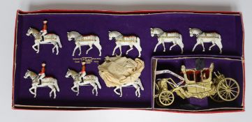 A cased set of a 1953 Coronation Coach and eight horses from Britain’s Historical Series by W.