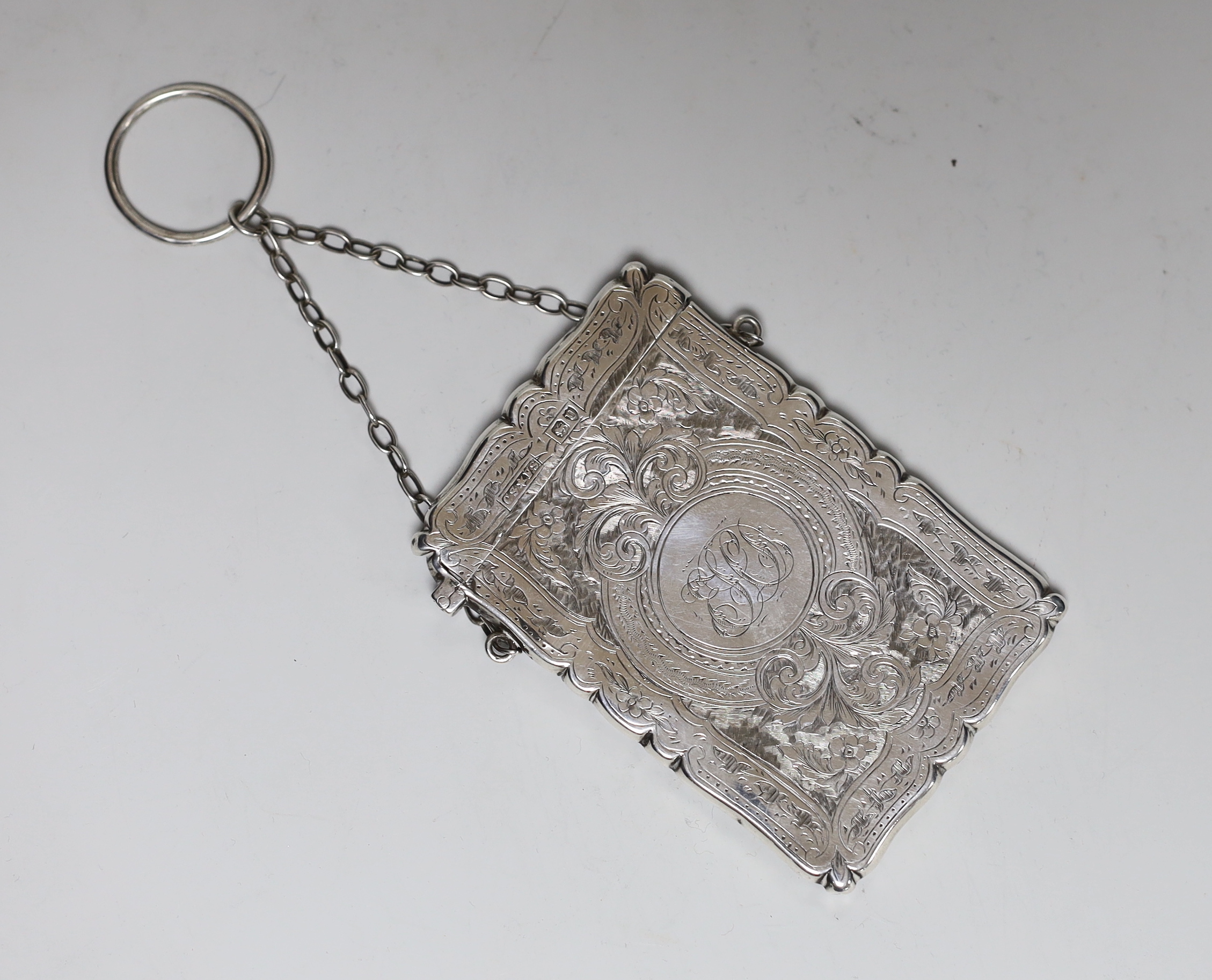 A late Victorian engraved silver card case, Saunders & Shepherd, London, 1895, 95mm.