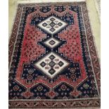 A Caucasian style blue and red ground rug, 180 x 130cm
