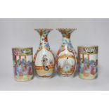 A pair of 19th century Cantonese famille rose porcelain brushpots, decorated with figural scenes,