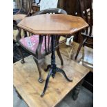 A Victorian and later mahogany and cast iron octagonal top tripod table, width 50cm, height 74cm