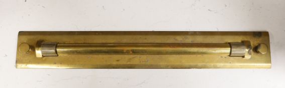 A military brass parallel ruler, serial number 3938