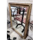 An early 20th century rectangular gilt framed wall mirror, width 66cm, height 91cm