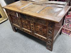 A later parquetry inlaid oak coffer, 17th century and later, length 112cm, depth 50cm, height 82cm