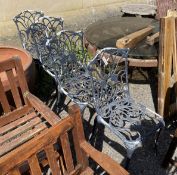 A set of four painted aluminium garden chairs