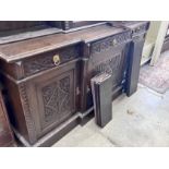 An early 20th century carved oak breakfront library bookcase, width 206cm, depth 54cm, height 260cm