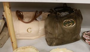 A Gucci brown suede and leather shoulder bag with gilt monogram badge, together with a Chloe