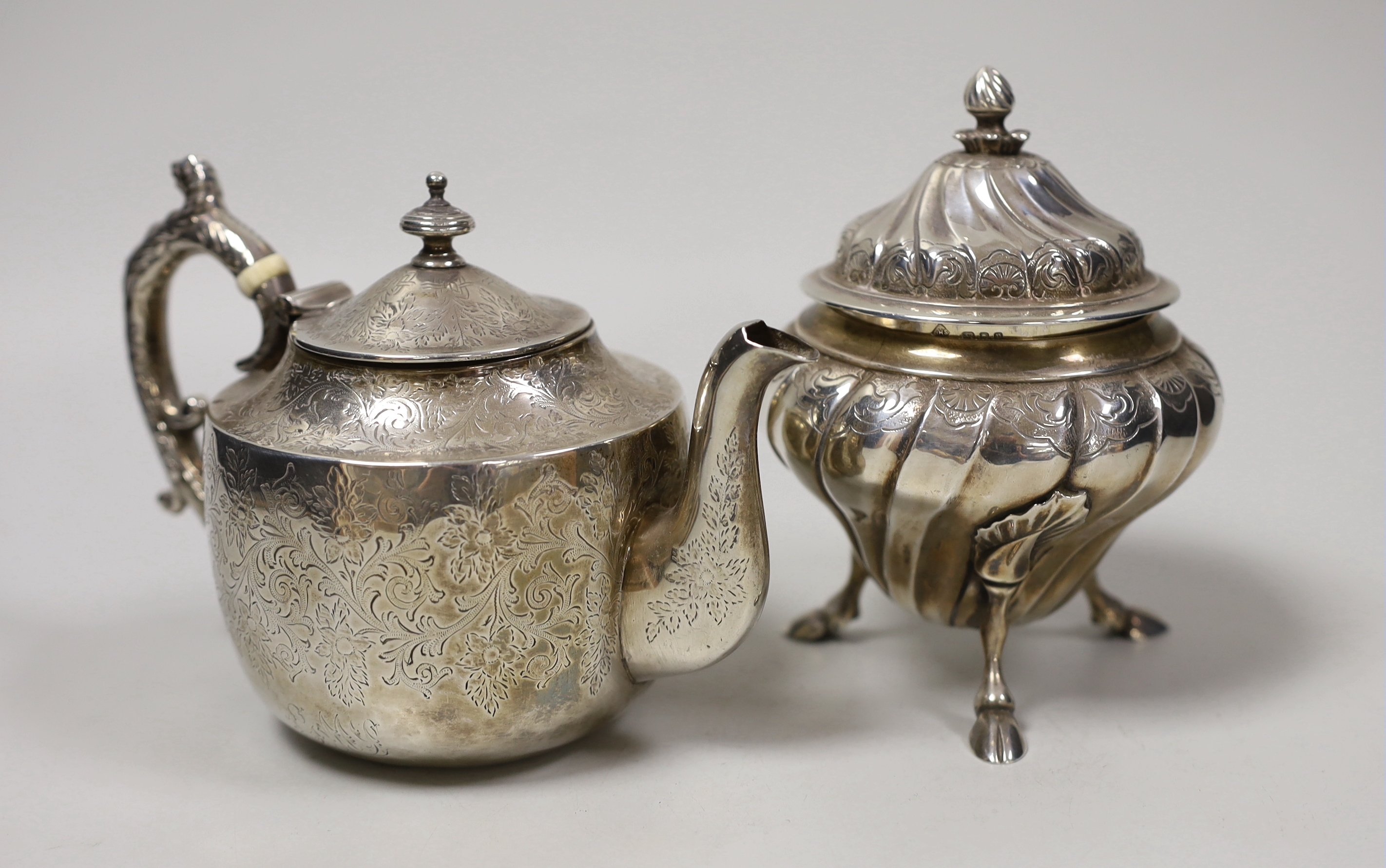 A small Victorian Scottish silver bachelor's teapot with ivory insulators, Glasgow, 1888 together