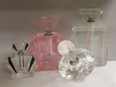 Four Art Deco fragrance bottles