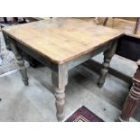 A Victorian style square pine kitchen table with painted underframe, width 90cm, height 77cm