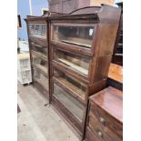 A pair of Edwardian two tier oak Lebus four section bookcases, width 89cm, depth 36cm, height 166cm