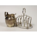 An Edwardian small silver five bar toast rack, Birmingham, 1906, length 94mm and a later silver ceam