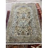 An Isfahan ivory ground rug, 230 x 144cm