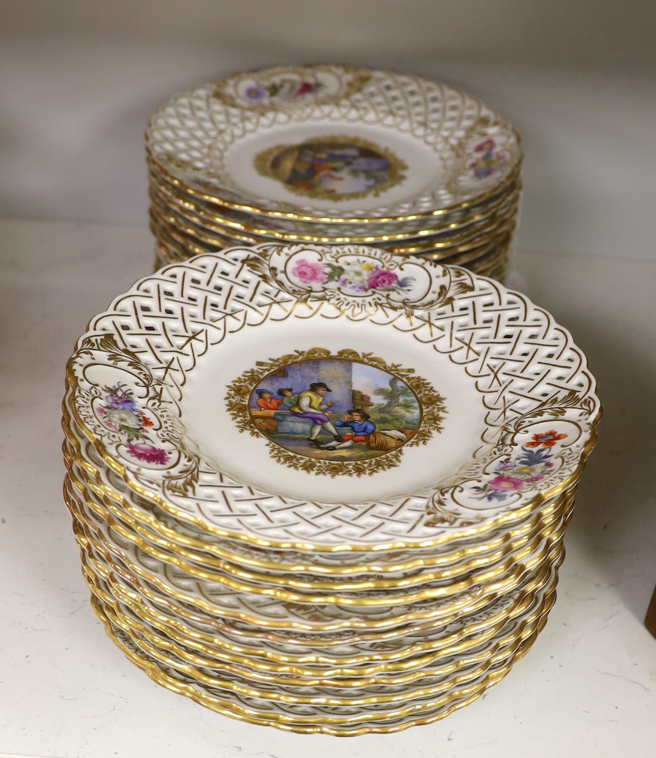 A set of twenty four 19th century Dresden plates, 24cm diameter