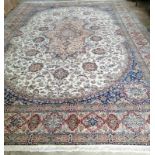 A Tabriz pink ground carpet, 510 x 355cm