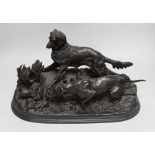 After Pierre-Jules Mêne (1810-1879). A bronze group of hounds and a quail, 39cm