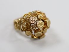 A 1960's/1970's 9ct gold modernist ring, size N, 9.1 grams.