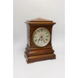 A late Victorian mahogany mantel clock, 35cm