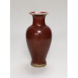 A Chinese sang de boeuf baluster vase, 18.5cm