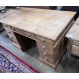 A modern Victorian style pine pedestal desk, width 120cm, depth 72cm, height 76cm