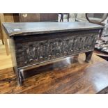 A 17th century style linenfold oak coffer, length 97cm, width 30cm, height 49cm