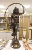 In the manner of Auguste Moreau (1834 – 1917). A bronze of a lady, plaque to base reads ‘Diuir’,
