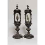 A pair of Victorian walnut reliquaries, 29cm