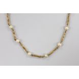 A modern 9ct gold, cultured pearl and entwined bar link necklace, 38cm, gross weight 10.8 grams.