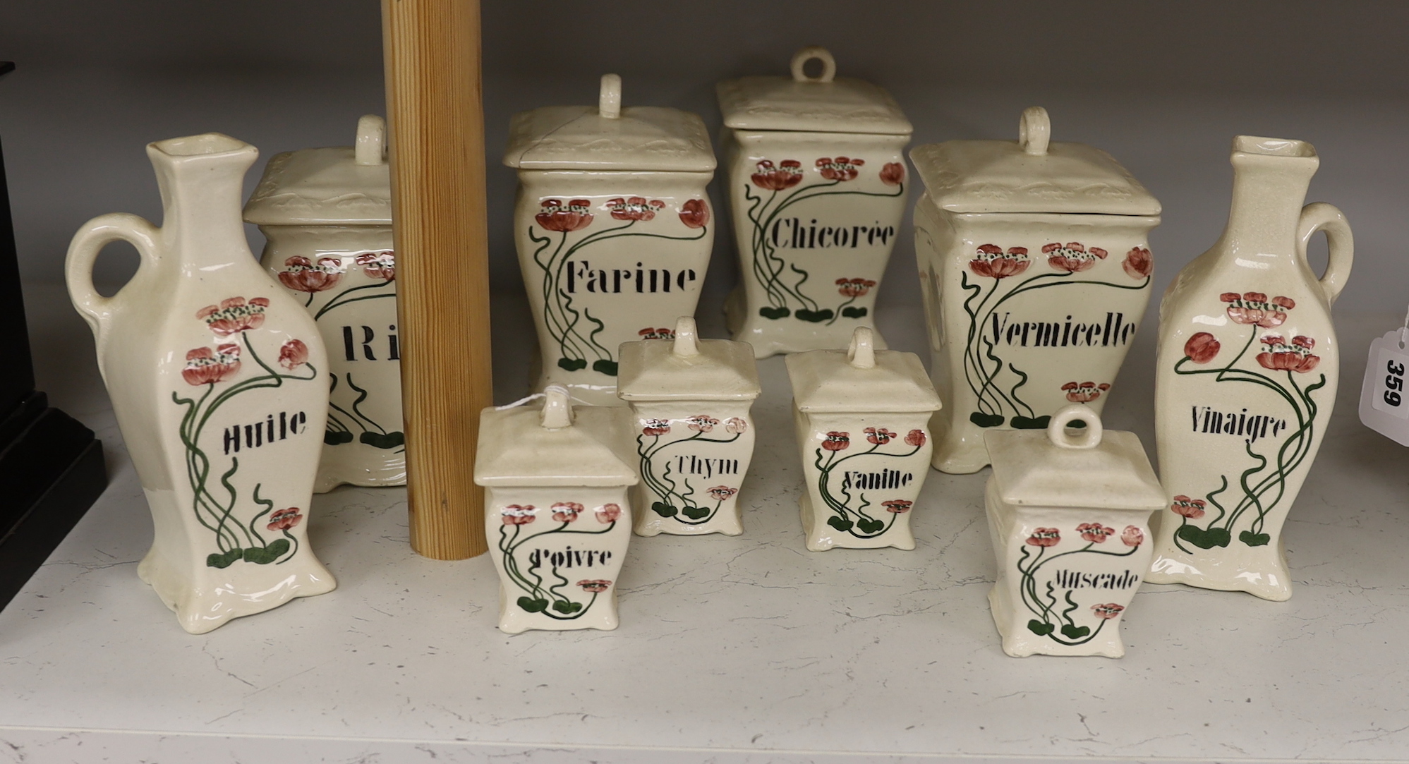 A set of ten French Art Nouveau kitchen storage jars, tallest 20cm