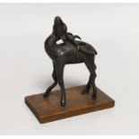 A small Chinese bronze figure of a standing deer, 13cm