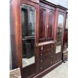 An Edwardian satinwood banded mahogany mirrored wardrobe, width 190cm, depth 56cm, height 212cm