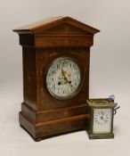 An Edwardian inlaid rosewood mantel clock and a carriage timepiece, tallest 36cm
