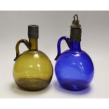 A pair of Victorian glass bottle decanters, tallest 23cm