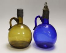 A pair of Victorian glass bottle decanters, tallest 23cm