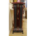 A maroon and black enamel Cannon Hilston heater, 95cm high, 39cm wide