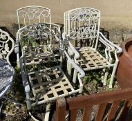 Two aluminium swivel garden chairs and three matching elbow chairs