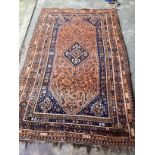 A Hamadan faded red ground rug, 260 x 160cm