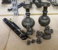 A set of Burmese bronze weights and a pair of bronze vases, 12cm