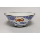 A 19th century Chinese blue and white bowl with iron-red bats, 23cm diam.