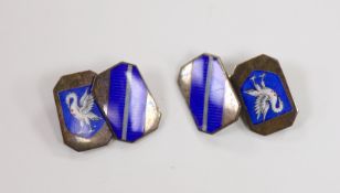 A cased pair of early 1950's 9ct gold and enamelled cufflinks with swan armorial, 17mm, gross weight