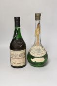 A bottle of Creme de menthe and a bottle of Delamain cognac (2)