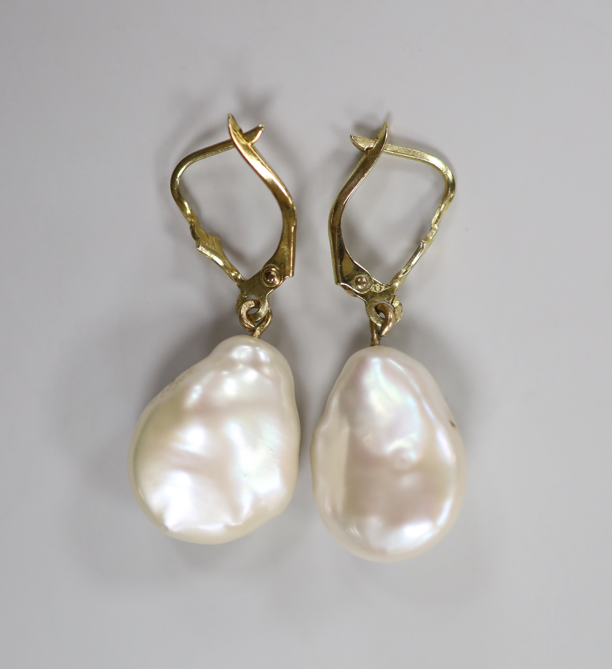 A pair of yellow metal and baroque pearl set drop earrings, each with inset rose cut diamond, - Image 2 of 2