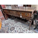 An 18th century and later oak low dresser on cabriole supports, width 178cm, depth 45cm, height