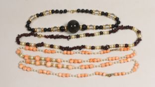 A modern garnet and cultured pearl necklace with yellow metal spacers and clasp, 48cm and three