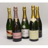 Five bottles of various champagnes: Pierre Darcys, G.H. Mumm, Chandon, Moët & Chandon and