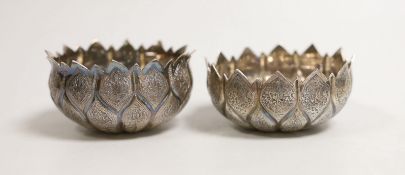 A pair of Indian white metal lotus leaf finger bowls, diameter 8cm, 4.9oz.