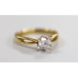 A yellow metal and solitaire diamond ring, size O, gross weight 4.2 grams, the stone weighing