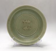 A Chinese celadon glazed 'twin fish' dish, 30cm diameter