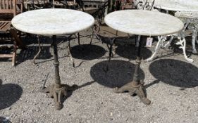 A pair of circular reconstituted marble and cast metal pub tables, diameter 60cm, height 70cm